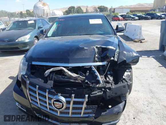 2012 Cadillac CTS Performance z VIN 1G6DJ5E30C0156576, wystawiony jako IAAI lot #42287858 z przebiegiem 106 497 mil mil oraz . Historia ofert i sprzedaży dostępna na DreamBid. Obrazek 13.