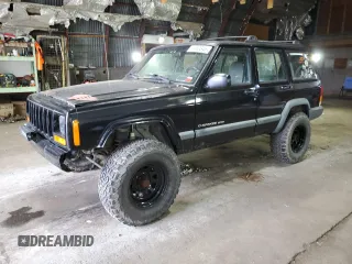 2000 Jeep Cherokee with VIN 1J4FF48S1YL141248, listed as a Copart auction lot 61950345 with 175,528 mi miles and Clean title. Bid and sale history available at DreamBid. Image 1.
