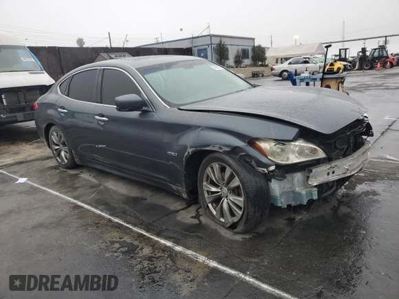 2012 Infiniti M Hybrid with VIN JN1EY1AP7CM910647, listed as a Copart auction lot 44309725 with 97,833 mi miles and Salvage Title. Bid and sale history available at carsss.com. Image 4.