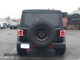 2022 Jeep Wrangler Unlimited Rubicon with VIN 1C4HJXFGXNW127064, listed as a IAAI auction lot 41491203 with 47,700 mi miles and . Bid and sale history available at DreamBid. Image 16.