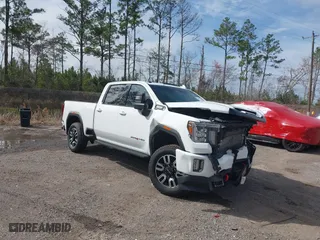 2022 GMC Sierra 2500HD AT4 with VIN 1GT19PEYXNF230277, listed as a IAAI auction lot 40617736 with 80,327 mi miles. Bid and sale history available at carsss.com. Image 1.