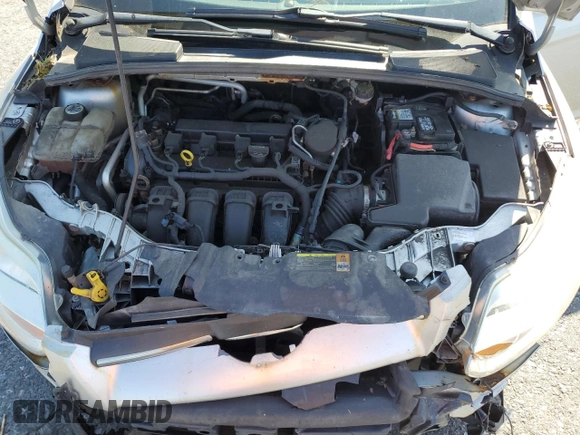 2012 Ford Focus SE z VIN 1FAHP3K20CL219046, wystawiony jako Copart lot #58771285 z przebiegiem 167 703 mil mil oraz Szkoda całkowita • Salvage title. Historia ofert i sprzedaży dostępna na DreamBid. Obrazek 11.