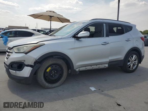 2013 Hyundai Santa Fe Sport z VIN 5XYZUDLA2DG069389, wystawiony jako Copart lot #64054684 z przebiegiem 162 861 mil mil oraz Szkoda całkowita • Salvage title. Historia ofert i sprzedaży dostępna na DreamBid. Obrazek 1.