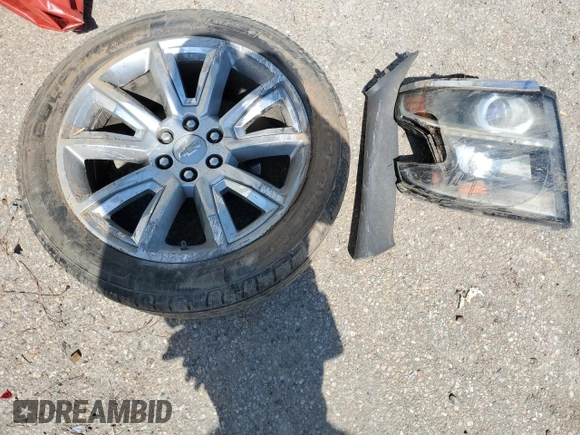 2015 Chevrolet Tahoe LT with VIN 1GNSCBKC4FR599533, listed as a Copart auction lot 50995255 with Not provided miles and Salvage title. Bid and sale history available at DreamBid. Image 13.