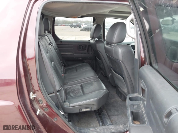 2014 Honda Ridgeline RTL with VIN 5FPYK1F52EB010700, listed as a IAAI auction lot 41490401 with 180,947 mi miles. Bid and sale history available at carsss.com. Image 8.