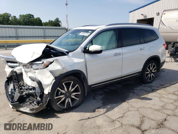 2022 Honda Pilot Touring 7-Passenger with VIN 5FNYF6H64NB054732, listed as a Copart auction lot 63036104 with 33,252 mi miles and Salvage Title. Bid and sale history available at carsss.com. Image 1.