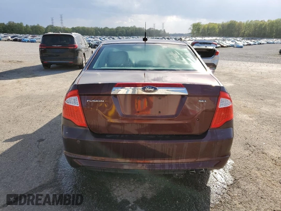 2012 Ford Fusion SEL with VIN 3FAHP0JAXCR149502, listed as a Copart auction lot 52433465 with 228,886 mi miles and Salvage Title. Bid and sale history available at DreamBid. Image 6.