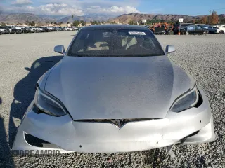 2016 Tesla Model S 90D with VIN 5YJSA1E26GF147974, listed as a Copart auction lot 82815404 with 126,609 mi miles and Salvage Title. Bid and sale history available at DreamBid. Image 5.