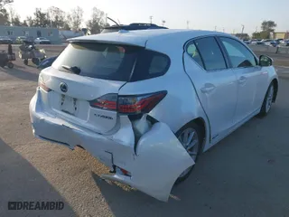 2013 Lexus CT 200h Hybrid with VIN JTHKD5BHXD2155841, listed as a IAAI auction lot 41939202 with 122,302 mi miles. Bid and sale history available at carsss.com. Image 4.