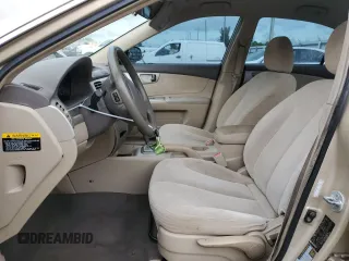 2008 Kia Optima LX z VIN KNAGE124385198719, wystawiony jako Copart lot #55449255 z przebiegiem 156 972 mil mil oraz Szkoda całkowita • Salvage title. Historia ofert i sprzedaży dostępna na DreamBid. Obrazek 7.