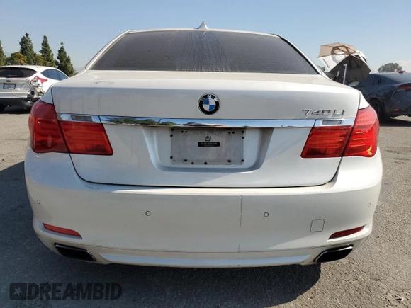 2012 BMW 7 Series 740Li with VIN WBAKB4C55CC575826, listed as a Copart auction lot 74012564 with 140,577 mi miles and Salvage Title. Bid and sale history available at carsss.com. Image 6.