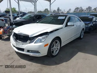 2013 Mercedes-Benz E 350 with VIN WDDKJ5KB1DF197335, listed as a IAAI auction lot 42272831 with 58,092 mi miles and . Bid and sale history available at DreamBid. Image 2.