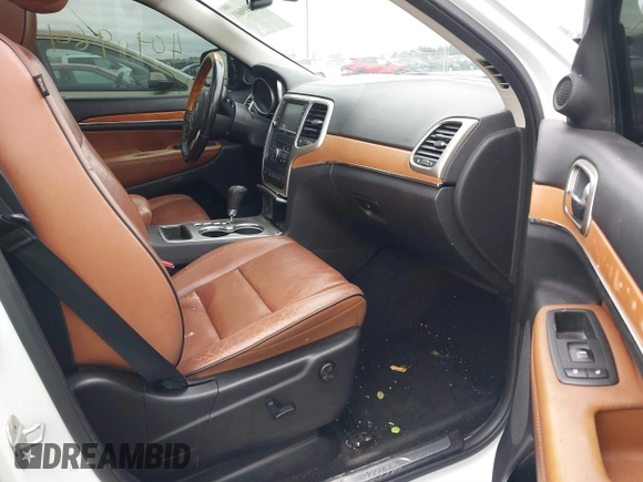 2013 Jeep Grand Cherokee Overland with VIN 1C4RJECG3DC620873, listed as a IAAI auction lot 40909601 with 195,374 mi miles. Bid and sale history available at carsss.com. Image 5.