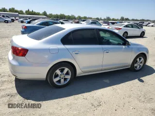 2012 Volkswagen Jetta TDI with VIN 3VWLL7AJ4CM325799, listed as a Copart auction lot 61835265 with 153,404 mi miles and Salvage title. Bid and sale history available at DreamBid. Image 3.