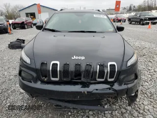 2015 Jeep Cherokee Latitude with VIN 1C4PJLCB9FW706934, listed as a Copart auction lot 52696105 with 125,205 mi miles and Salvage Title. Bid and sale history available at DreamBid. Image 5.