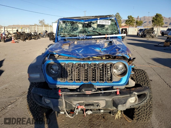 2024 Jeep Wrangler Rubicon z VIN 1C4PJXCG1RW298288, wystawiony jako Copart lot #81371914 z przebiegiem 4 445 mil mil oraz Szkoda całkowita • Salvage title. Historia ofert i sprzedaży dostępna na DreamBid. Obrazek 5.