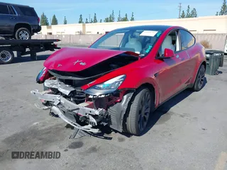 2021 Tesla Model Y Performance with VIN 5YJYGDEF4MF092062, listed as a IAAI auction lot 41583793 with 57,194 mi miles and . Bid and sale history available at DreamBid. Image 19.