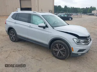 2018 Volkswagen Tiguan SEL z VIN 3VV3B7AXXJM039125, wystawiony jako IAAI lot #42125540 z przebiegiem 91 551 mil mil oraz . Historia ofert i sprzedaży dostępna na DreamBid. Obrazek 1.