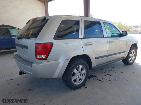 2008 Jeep Grand Cherokee Laredo with VIN 1J8GR48K18C222454, listed as a IAAI auction lot 42047541 with 180,145 mi miles. Bid and sale history available at carsss.com. Image 4.