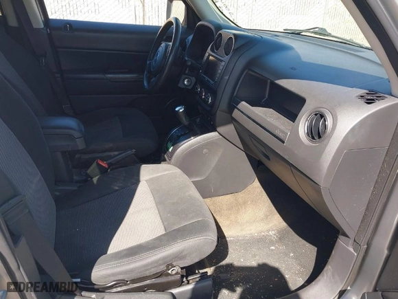 2014 Jeep Patriot Latitude with VIN 1C4NJRFB6ED883893, listed as a IAAI auction lot 41780864 with 119,610 mi miles. Bid and sale history available at carsss.com. Image 5.