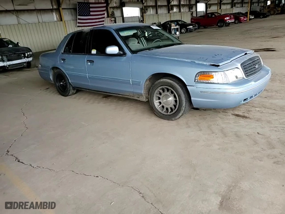 1999 Ford Crown Victoria LX with VIN 2FAFP74W2XX159035, listed as a Copart auction lot 47583215 with 194,427 mi miles and Salvage Title. Bid and sale history available at carsss.com. Image 11.
