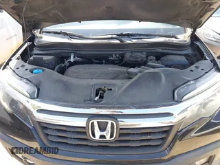 2018 Honda Ridgeline RTL-T with VIN 5FPYK3F67JB013171, listed as a IAAI auction lot 42498827 with 124,415 mi miles and . Bid and sale history available at DreamBid. Image 10.