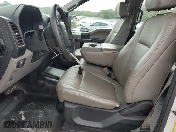 2020 Ford F-150 XL with VIN 1FTEW1CB0LFC28122, listed as a Copart auction lot 71420114 with 93,097 mi miles and Salvage Title. Bid and sale history available at carsss.com. Image 7.