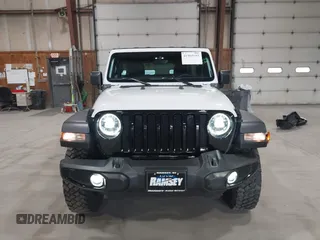 2023 Jeep Wrangler Sport S with VIN 1C4HJXDN2PW632584, listed as a IAAI auction lot 41965191 with 20,288 mi miles and . Bid and sale history available at DreamBid. Image 13.