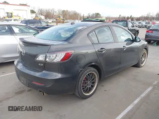 2011 Mazda 3 S Grand Touring with VIN JM1BL1W54B1363052, listed as a IAAI auction lot 41696177 with 143,852 mi miles and . Bid and sale history available at DreamBid. Image 4.