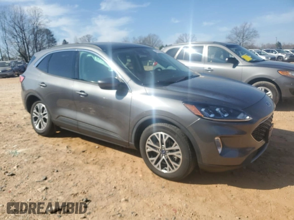 2021 Ford Escape SEL with VIN 1FMCU9H94MUB29569, listed as a Copart auction lot 48378495 with 27,702 mi miles and Salvage Title. Bid and sale history available at DreamBid. Image 4.