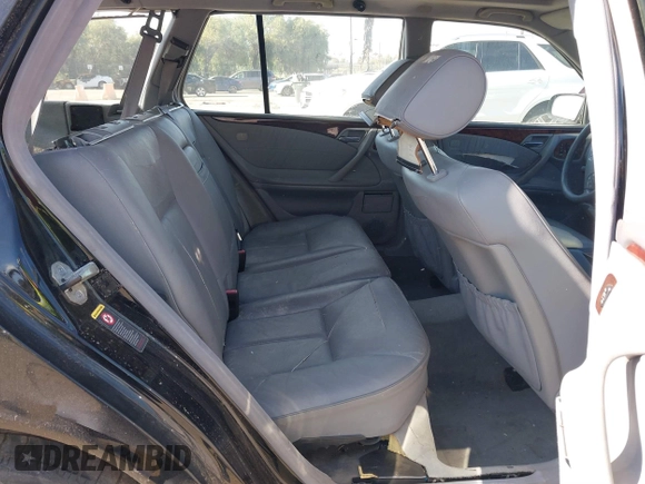 2001 Mercedes-Benz E-Class with VIN WDBJH65J31B381879, listed as a IAAI auction lot 41855504 with 153,667 mi miles. Bid and sale history available at carsss.com. Image 8.