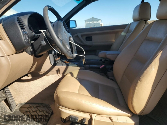 1997 BMW 3-Series 328IC with VIN WBABK8324VET96407, listed as a Copart auction lot 79532034 with 143,934 mi miles and Clean Title. Bid and sale history available at carsss.com. Image 7.