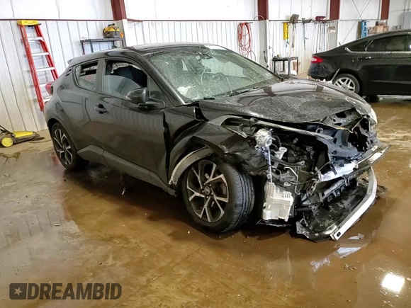 2018 Toyota C-HR XLE z VIN NMTKHMBX0JR041387, wystawiony jako Copart lot #57050385 z przebiegiem Nie podano mil oraz Szkody całkowita. Historia ofert i sprzedaży dostępna na DreamBid. Obrazek 14.