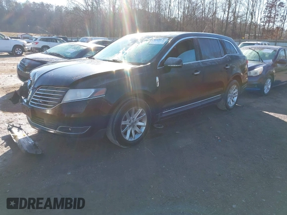 2018 Lincoln MKT with VIN 2LMHJ5NK5JBL02245, listed as a IAAI auction lot 41430571 with 293,537 mi miles and . Bid and sale history available at carsss.com. Image 2.