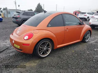 2010 Volkswagen New Beetle Coupe with VIN 3VWRG3AG3AM024689, listed as a IAAI auction lot 41037756 with 102,180 mi miles. Bid and sale history available at carsss.com. Image 4.