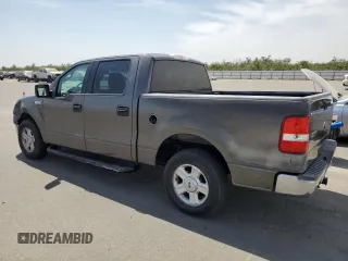 2004 Ford F-150 XLT with VIN 1FTRW12W74KC26169, listed as a Copart auction lot 68393914 with 118,059 mi miles and Salvage Title. Bid and sale history available at DreamBid. Image 2.