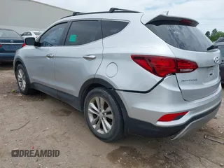 2018 Hyundai Santa Fe 2.0T z VIN 5XYZU4LA9JG537310, wystawiony jako IAAI lot #42393689 z przebiegiem Nie podano mil oraz . Historia ofert i sprzedaży dostępna na DreamBid. Obrazek 3.