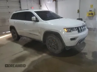 2017 Jeep Grand Cherokee Laredo with VIN 1C4RJFAGXHC632324, listed as a Copart auction lot 45951135 with 117,220 mi miles and Salvage title. Bid and sale history available at DreamBid. Image 4.