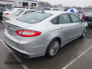 2016 Ford Fusion Titanium with VIN 3FA6P0K91GR360914, listed as a IAAI auction lot 41833665 with 107,367 mi miles and . Bid and sale history available at DreamBid. Image 4.