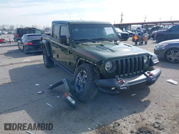 2023 Jeep Gladiator Rubicon with VIN 1C6JJTBGXPL586154, listed as a IAAI auction lot 41370352 with 11,207 mi miles and . Bid and sale history available at DreamBid. Image 1.