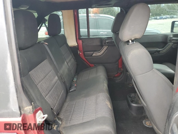 2012 Jeep Wrangler Unlimited Sport RHD with VIN 1C4BJWKGXCL102279, listed as a Copart auction lot 75360814 with 262,514 mi miles and Salvage title. Bid and sale history available at DreamBid. Image 11.