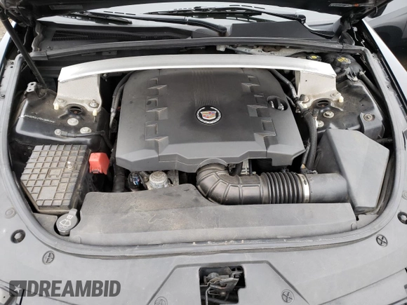 2013 Cadillac CTS z VIN 1G6DA1E31D0154605, wystawiony jako Copart lot #87380334 z przebiegiem 129 114 mil mil oraz Szkoda całkowita • Salvage title. Historia ofert i sprzedaży dostępna na DreamBid. Obrazek 11.