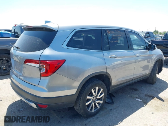 2019 Honda Pilot EX-L with VIN 5FNYF5H58KB040331, listed as a IAAI auction lot 41977727 with 90,655 mi miles and . Bid and sale history available at DreamBid. Image 4.