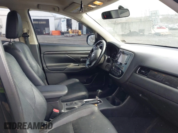 2016 Mitsubishi Outlander SE with VIN JA4AD3A39GZ003885, listed as a IAAI auction lot 41869646 with 193,320 mi miles and . Bid and sale history available at DreamBid. Image 5.