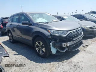 2020 Honda CR-V LX with VIN 5J6RW1H23LA004974, listed as a IAAI auction lot 42244135 with 36,141 mi miles and . Bid and sale history available at DreamBid. Image 1.