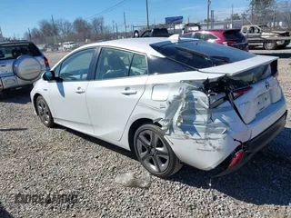 2021 Toyota Prius L Eco z VIN JTDKAMFUXM3142402, wystawiony jako IAAI lot #41665484 z przebiegiem 67 416 mil mil oraz . Historia ofert i sprzedaży dostępna na DreamBid. Obrazek 3.