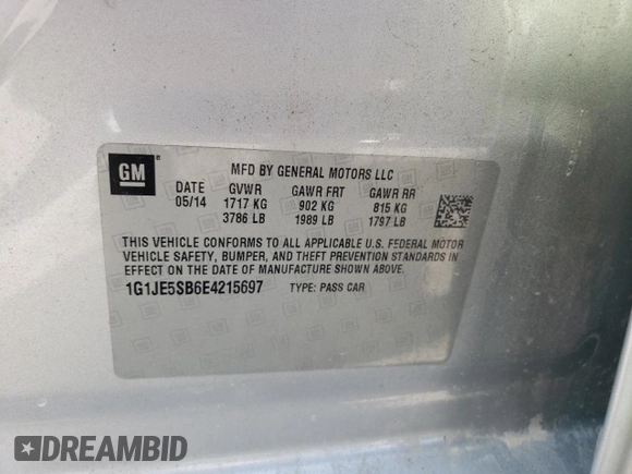 2014 Chevrolet Sonic LTZ z VIN 1G1JE5SB6E4215697, wystawiony jako Copart lot #70820024 z przebiegiem 166 414 mil mil oraz Szkoda całkowita • Salvage title. Historia ofert i sprzedaży dostępna na DreamBid. Obrazek 13.