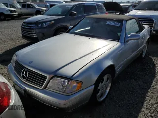 1999 Mercedes-Benz SL-Class with VIN WDBFA68F0XF176572, listed as a Copart auction lot 74715254 with 0 mi miles and Salvage Title. Bid and sale history available at carsss.com. Image 1.