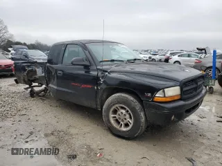 1999 Dodge Dakota SLT with VIN 1B7GL22X0XS275846, listed as a Copart auction lot 42619635 with 176,527 mi miles and Salvage Title. Bid and sale history available at carsss.com. Image 4.