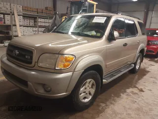 2003 Toyota Sequoia SR5 with VIN 5TDBT44A63S196764, listed as a IAAI auction lot 41866279 with 156,716 mi miles and . Bid and sale history available at DreamBid. Image 2.